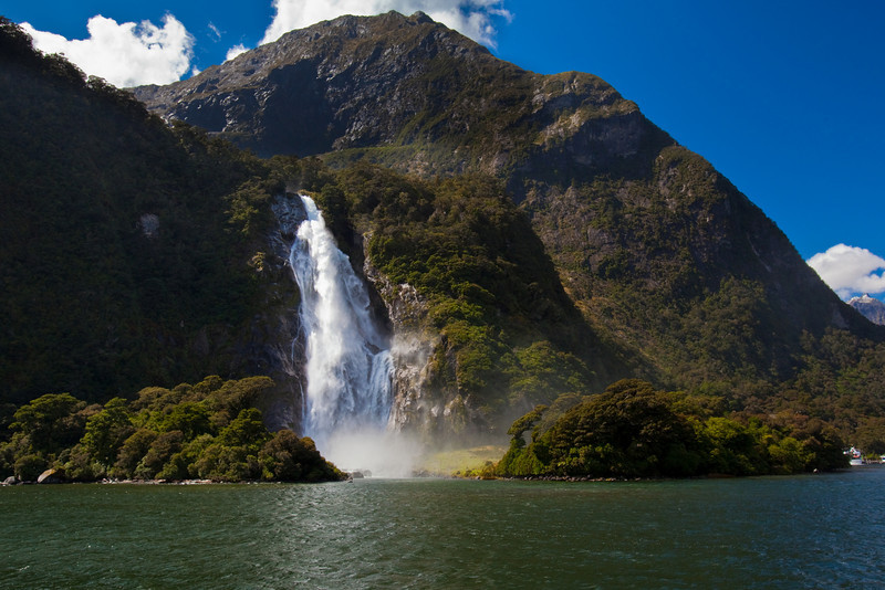 THE WATERFALL AT MILFORD SOUND, NEW ZEALAND 